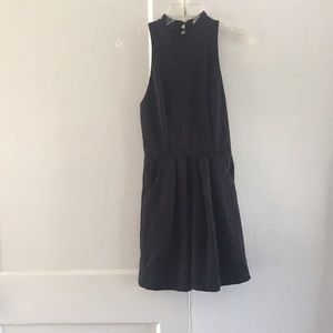Black patterned skater dress with pockets